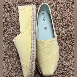 Brand new Yellow Toms shoes
